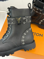 Louis Vuitton black leather ankle boot with studded strap detail