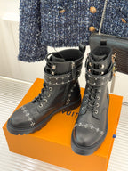 Louis Vuitton black lace-up ankle boots with studded trim