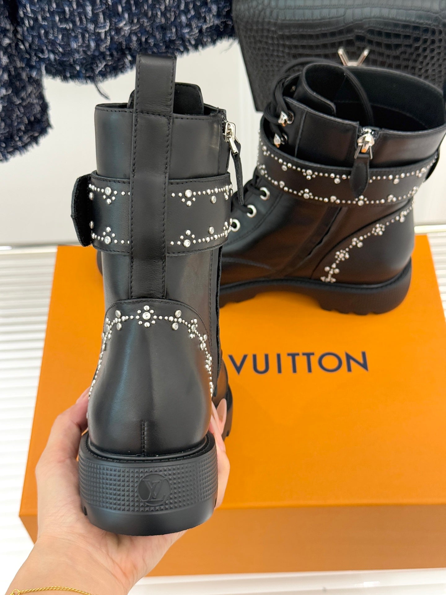 Louis Vuitton black studded ankle boots with front zipper pulls