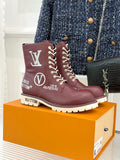 Burgundy Louis Vuitton lace-up leather ankle boots with LV and V patches, chunky sole