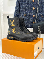 Louis Vuitton ladies lace-up ankle boots, black leather, gold logo, rubber sole