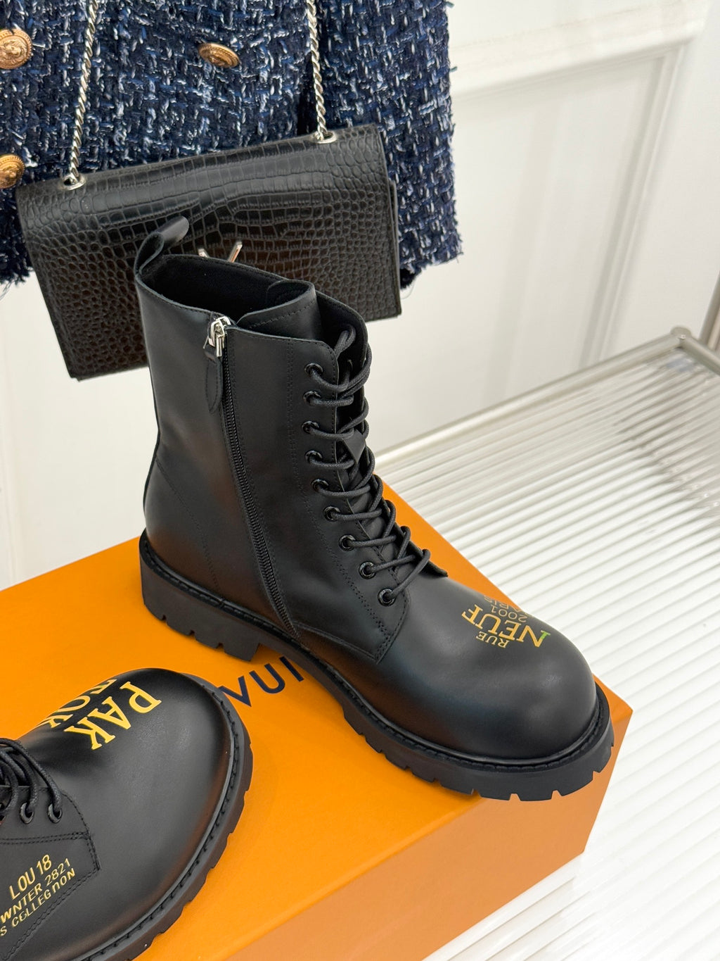 Louis Vuitton ladies lace-up ankle boots, black leather, side logo patches, chunky sole