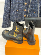 Louis Vuitton ladies lace-up ankle boots, black leather, heel and side logo prints