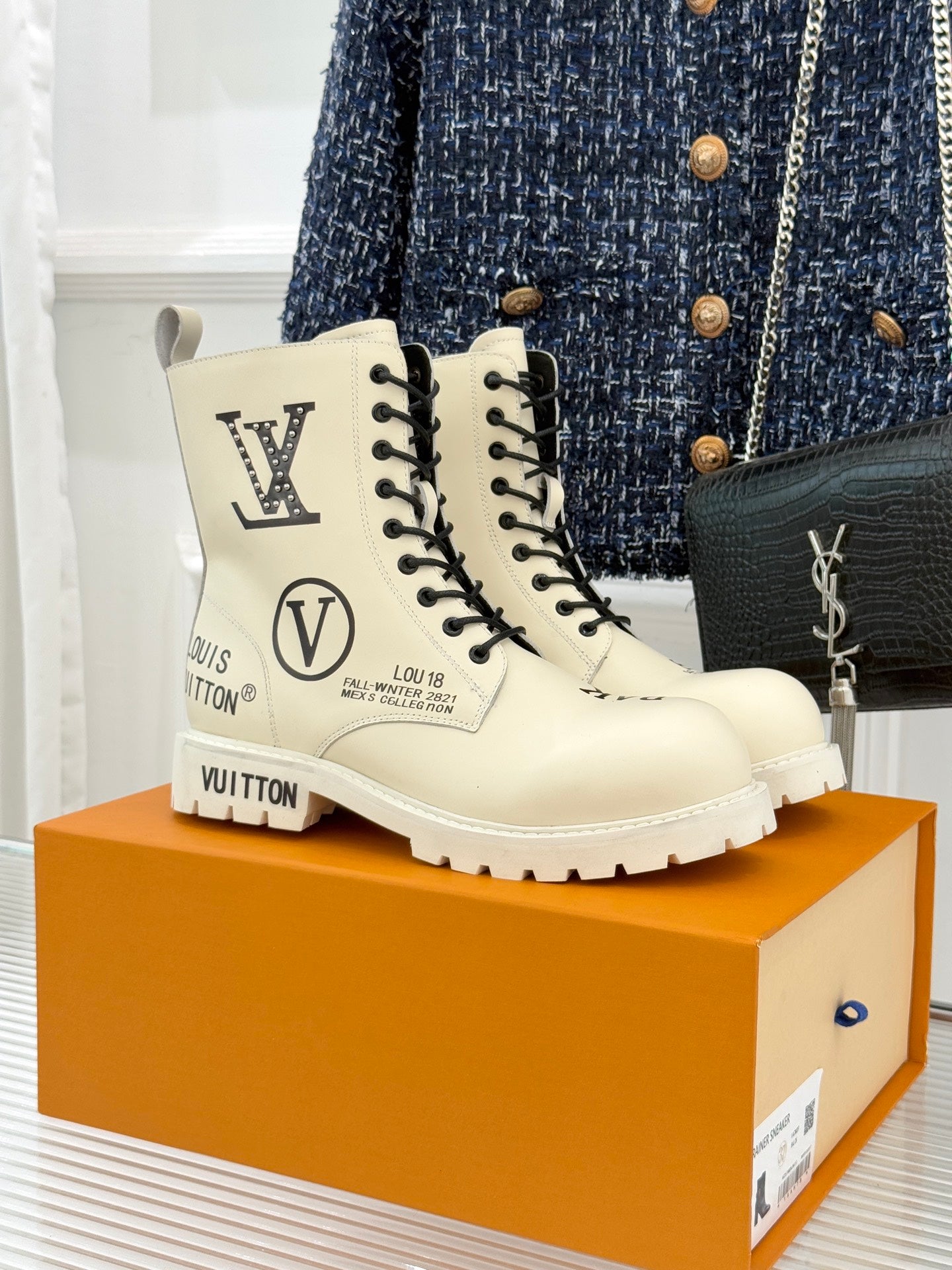 Louis Vuitton ladies ankle boots, cream leather with black laces and chunky sole