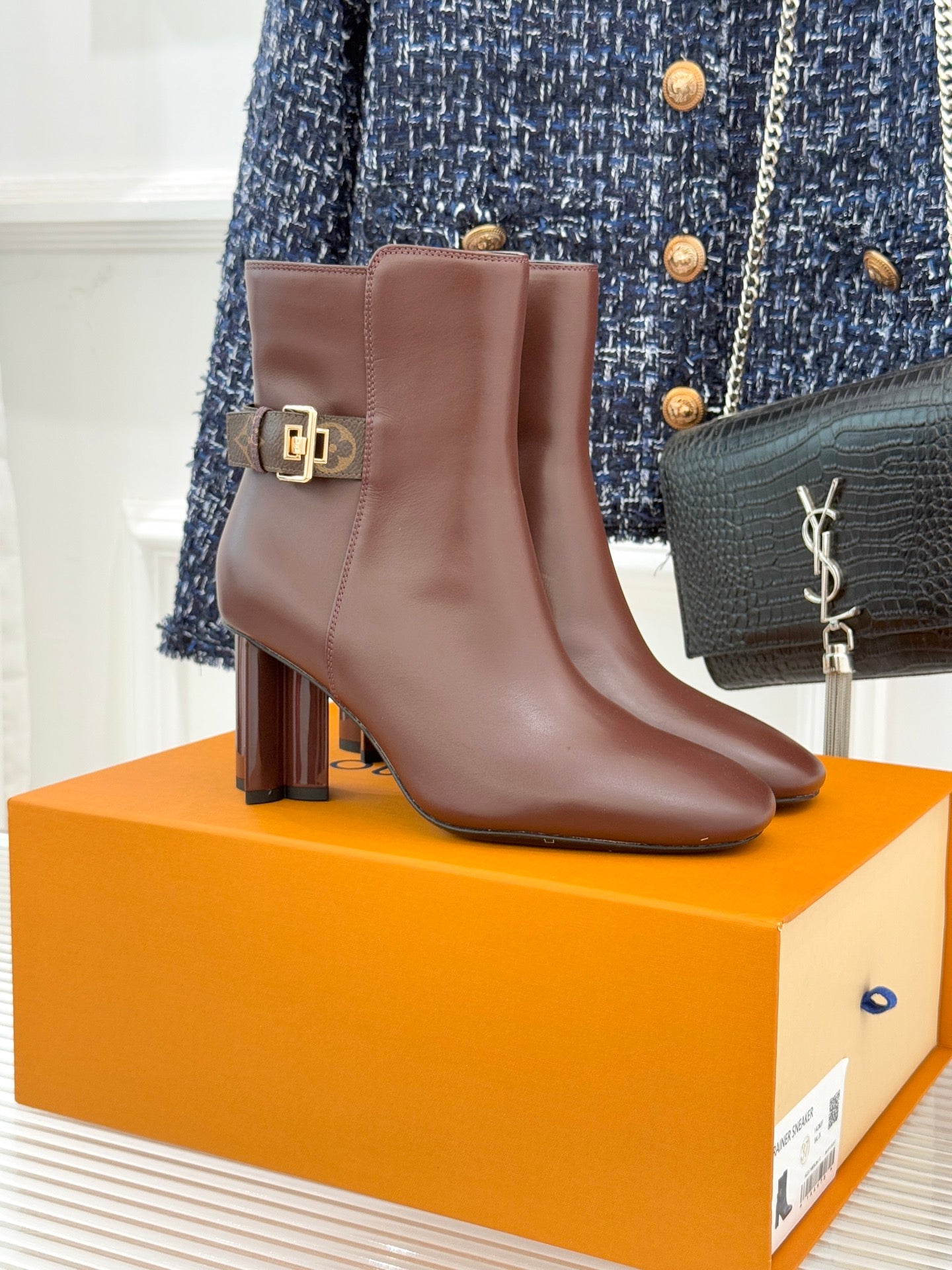 Women’s brown leather ankle boots with side zipper and block heel