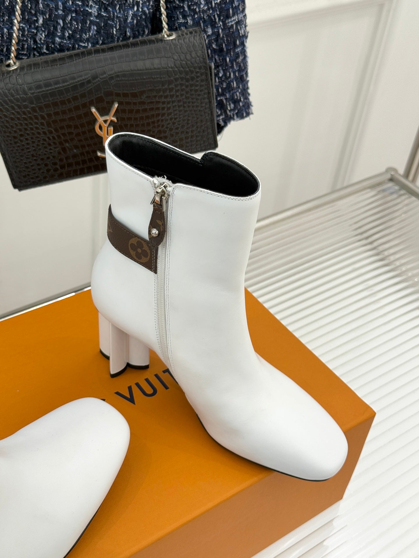 Louis Vuitton ladies white ankle boots with brown strap detail and mid block heel