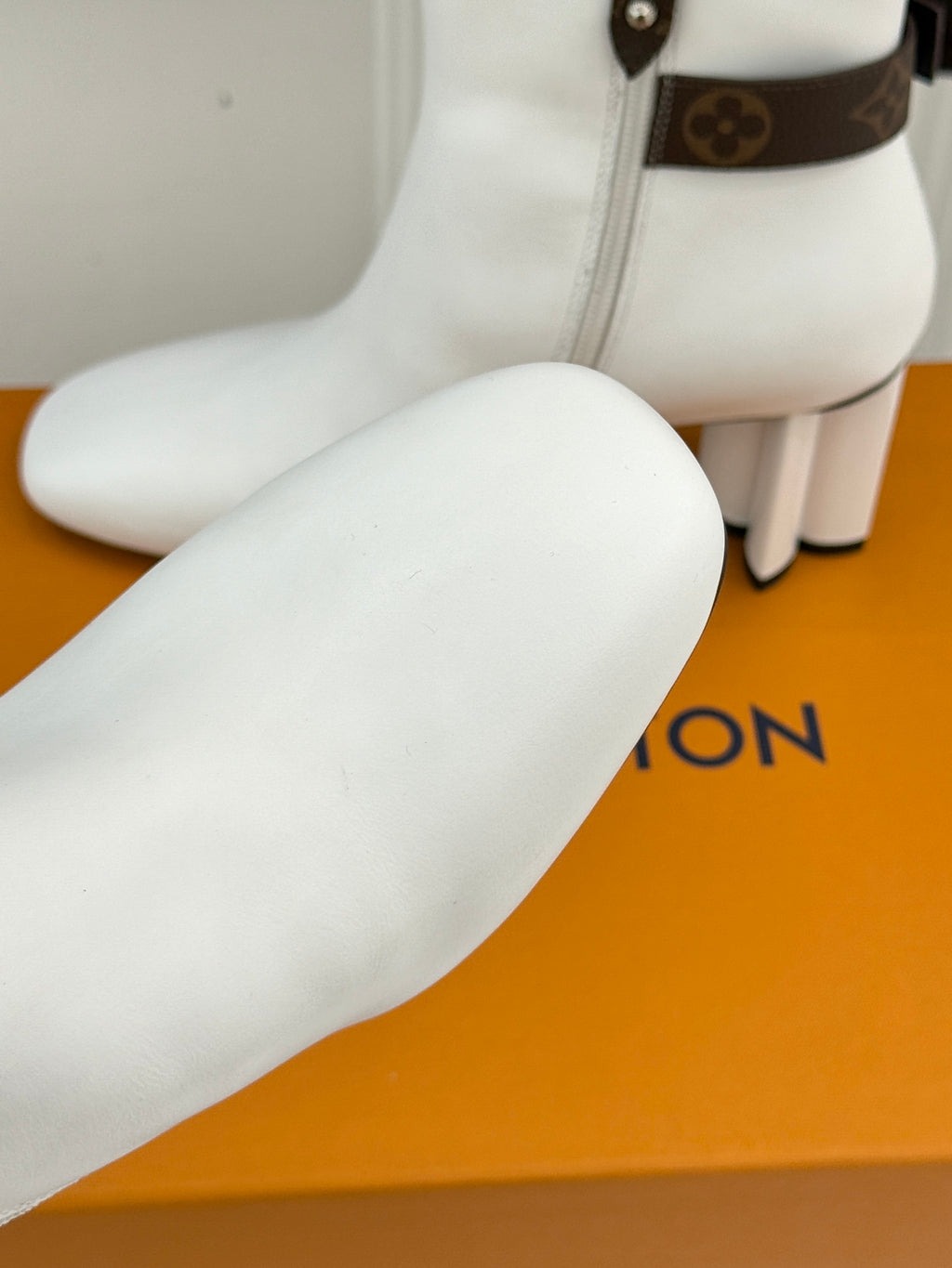 Louis Vuitton ladies white ankle boot toe and rounded front on block heel