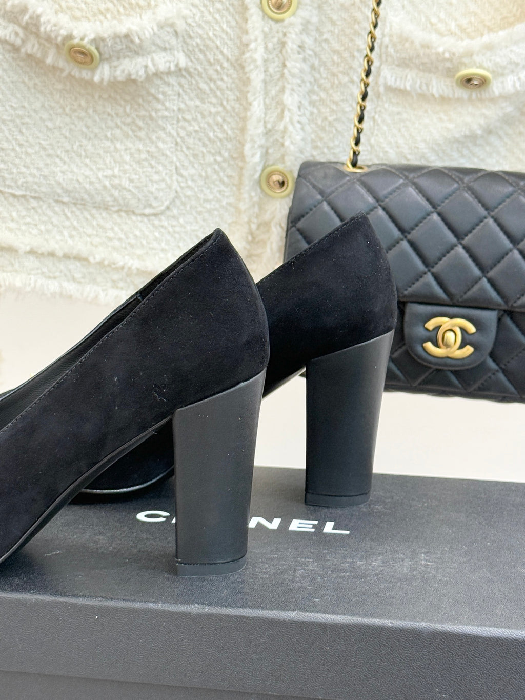 Black suede heeled loafers with gold CC emblem on vamp and block heel