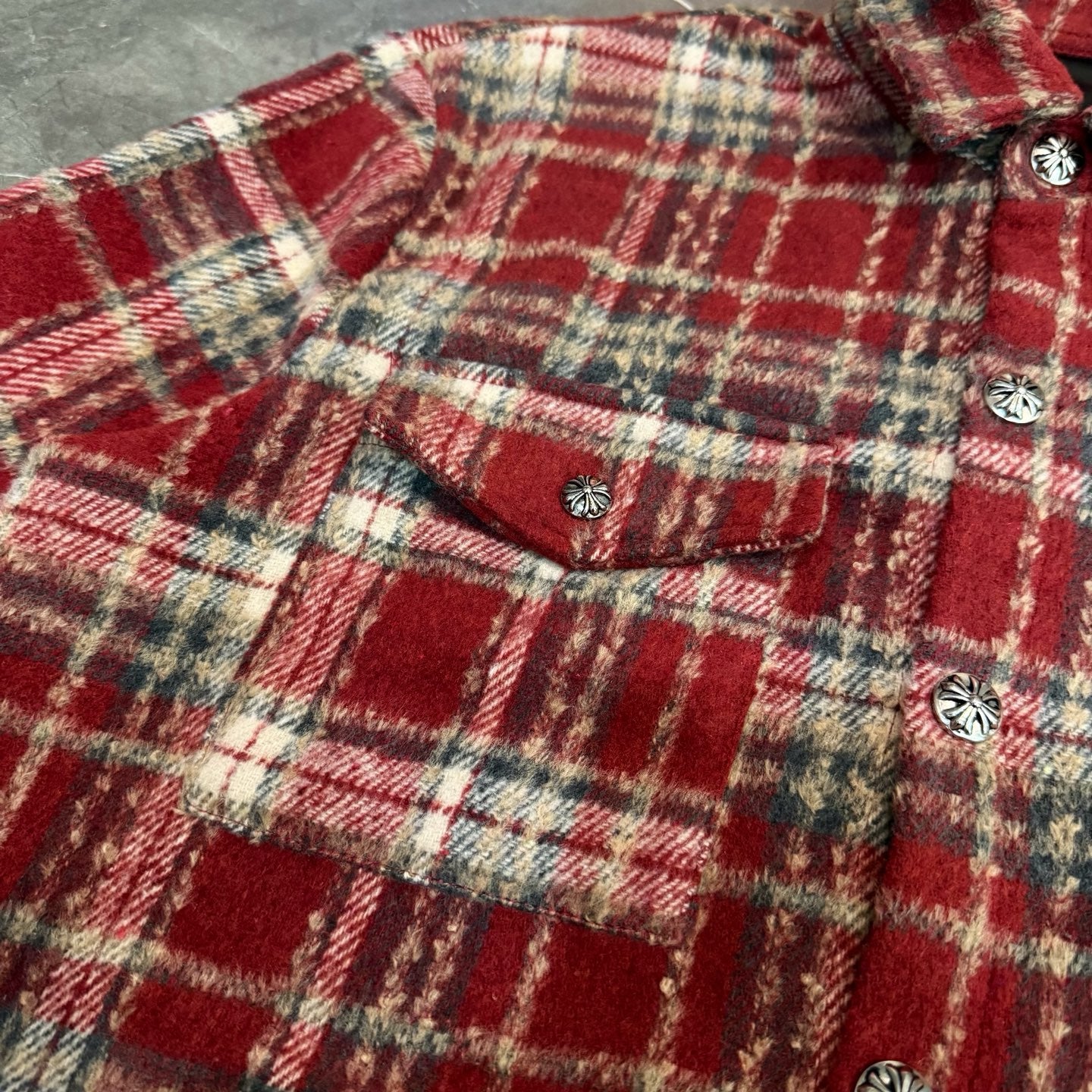 Red plaid long-sleeve coat with flap yoke and button detail