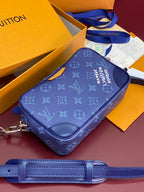 Louis Vuitton blue monogram crossbody bag with zip top and wide strap