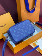 Louis Vuitton blue monogram crossbody bag with silver hardware and adjustable strap