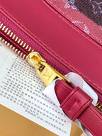 Louis Vuitton small bag in pink leather with gold zipper and buckle detail