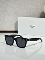 Celine glasses with glossy black rectangular frames and dark tinted lenses