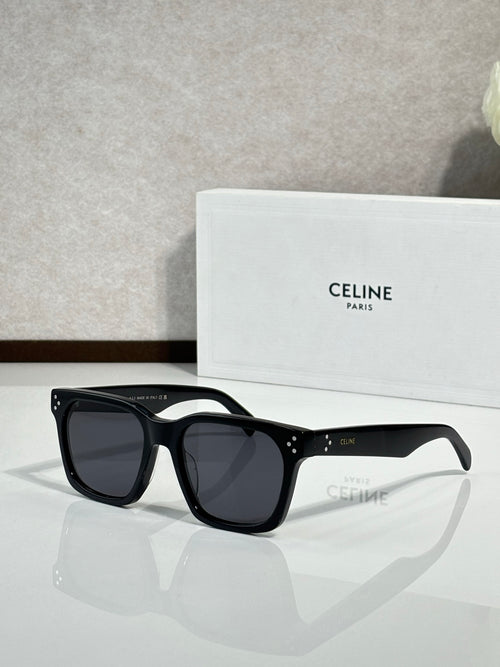Celine glasses with glossy black rectangular frames and dark tinted lenses