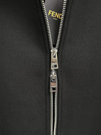 Fendi black zip-up sweatshirt close-up of metal zipper teeth and pull