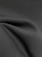 Fendi black sweatshirt fabric close-up with subtle textured weave