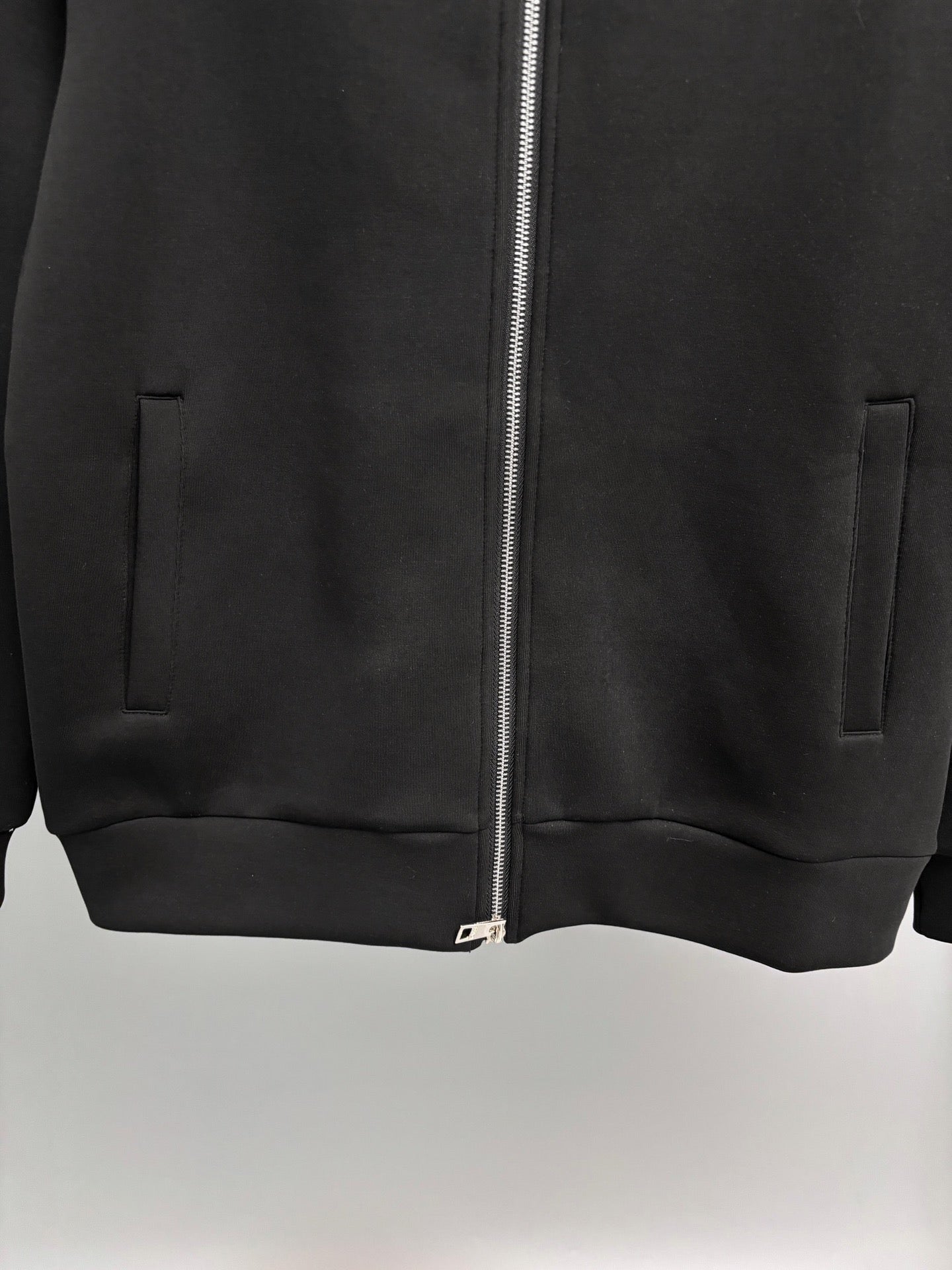 Fendi black zip-up sweatshirt front hem with pockets and centered zipper