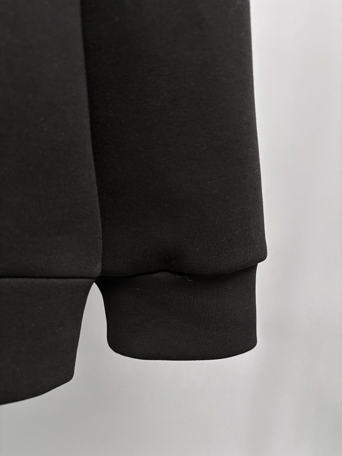 Fendi black sweatshirt lower hem with ribbed cuff and tapered fit