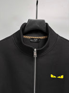 Fendi black zip-up sweatshirt collar with zipper and yellow eye logo