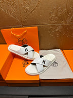 Hermes white leather slide sandals with black H logo straps and dust bag