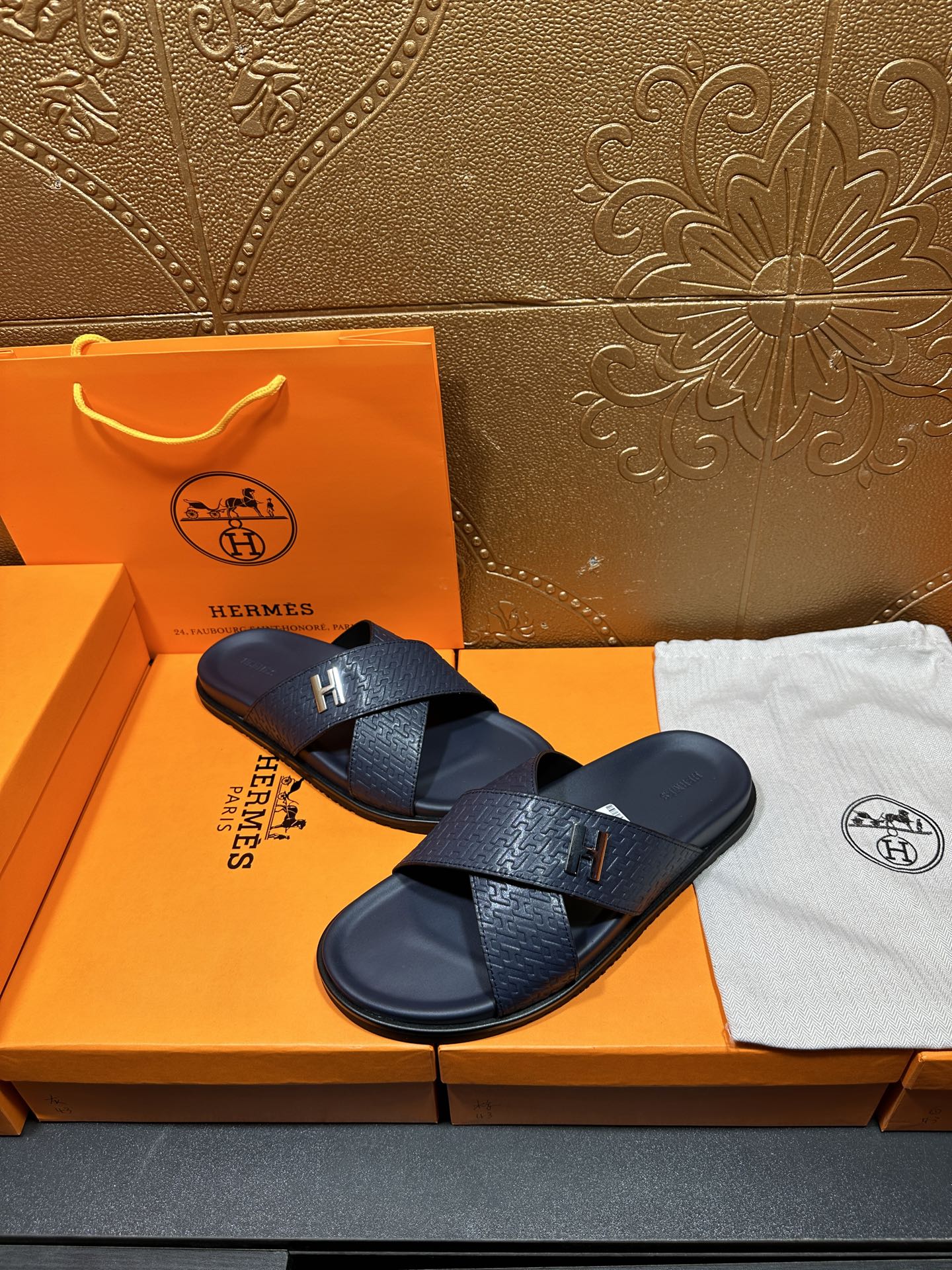 Navy textured slide sandals with H logo buckle and cross over straps