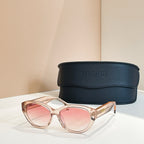 Versace sunglasses with translucent rose frames and pink lenses