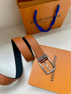 Louis Vuitton leather belt with tan straps and silver-tone rectangular buckle