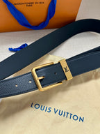 Louis Vuitton belt detail, dark blue leather strap with gold-tone square buckle.