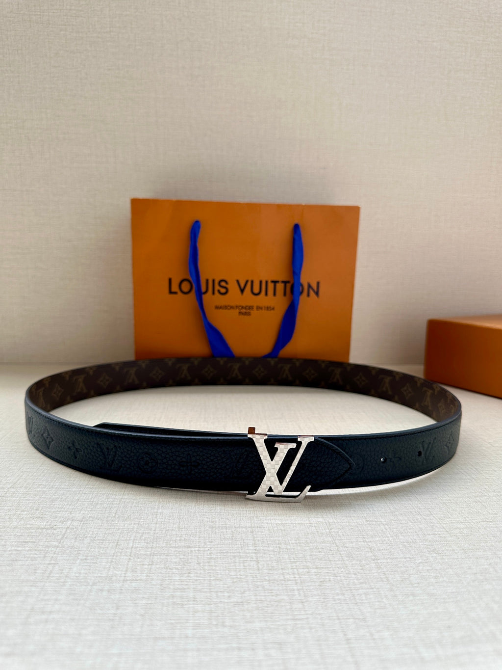 Dark blue leather belt with LV monogram and silver LV buckle