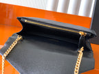 YSL black grained leather flap bag open view with gold zipper and chain