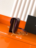 Burgundy small flap bag with gold chain strap and quilted texture