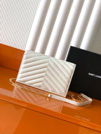 YSL white chevron quilted flap bag with gold chain strap