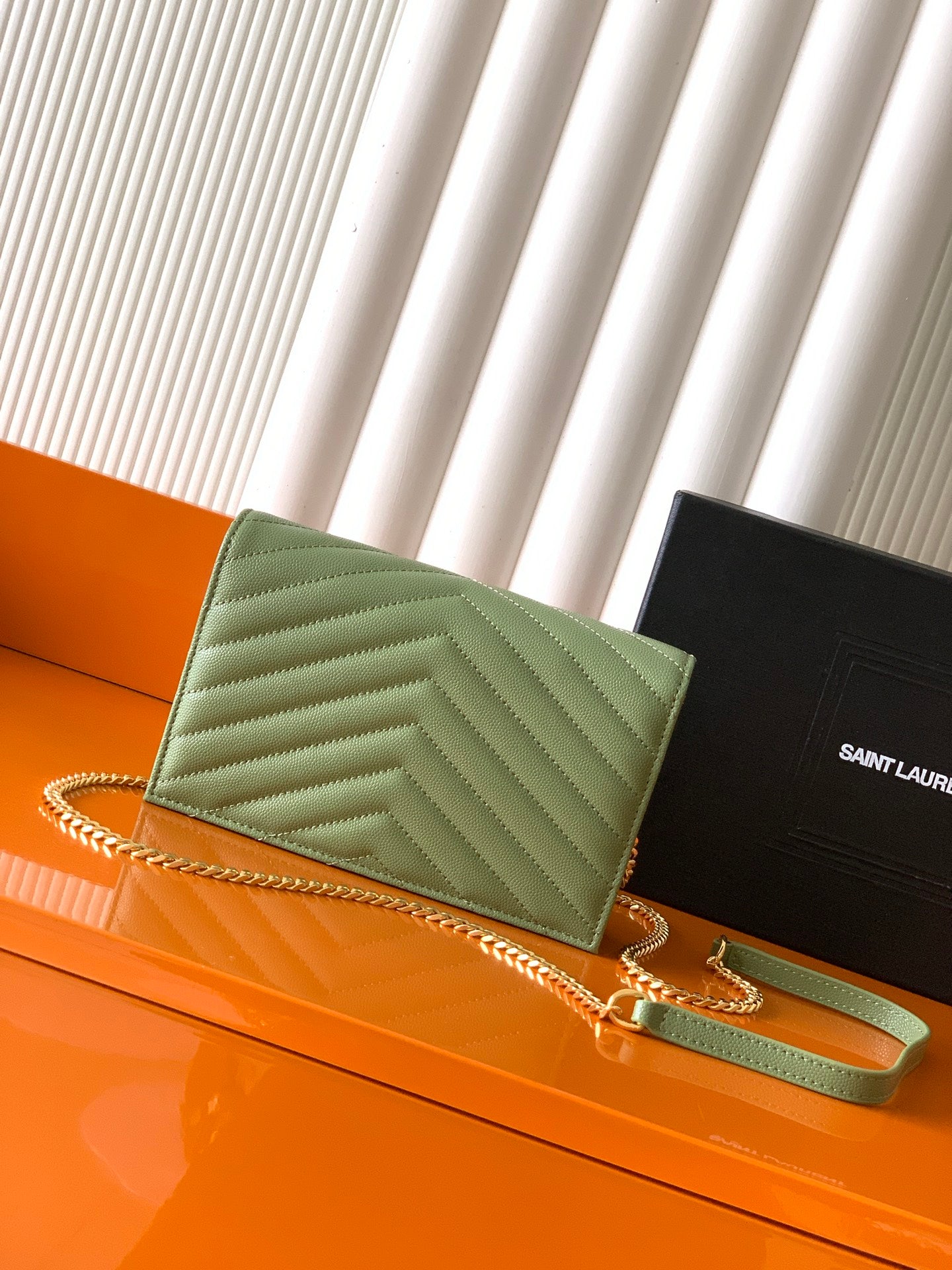 Green quilted YSL shoulder bag with gold chain strap and front clasp