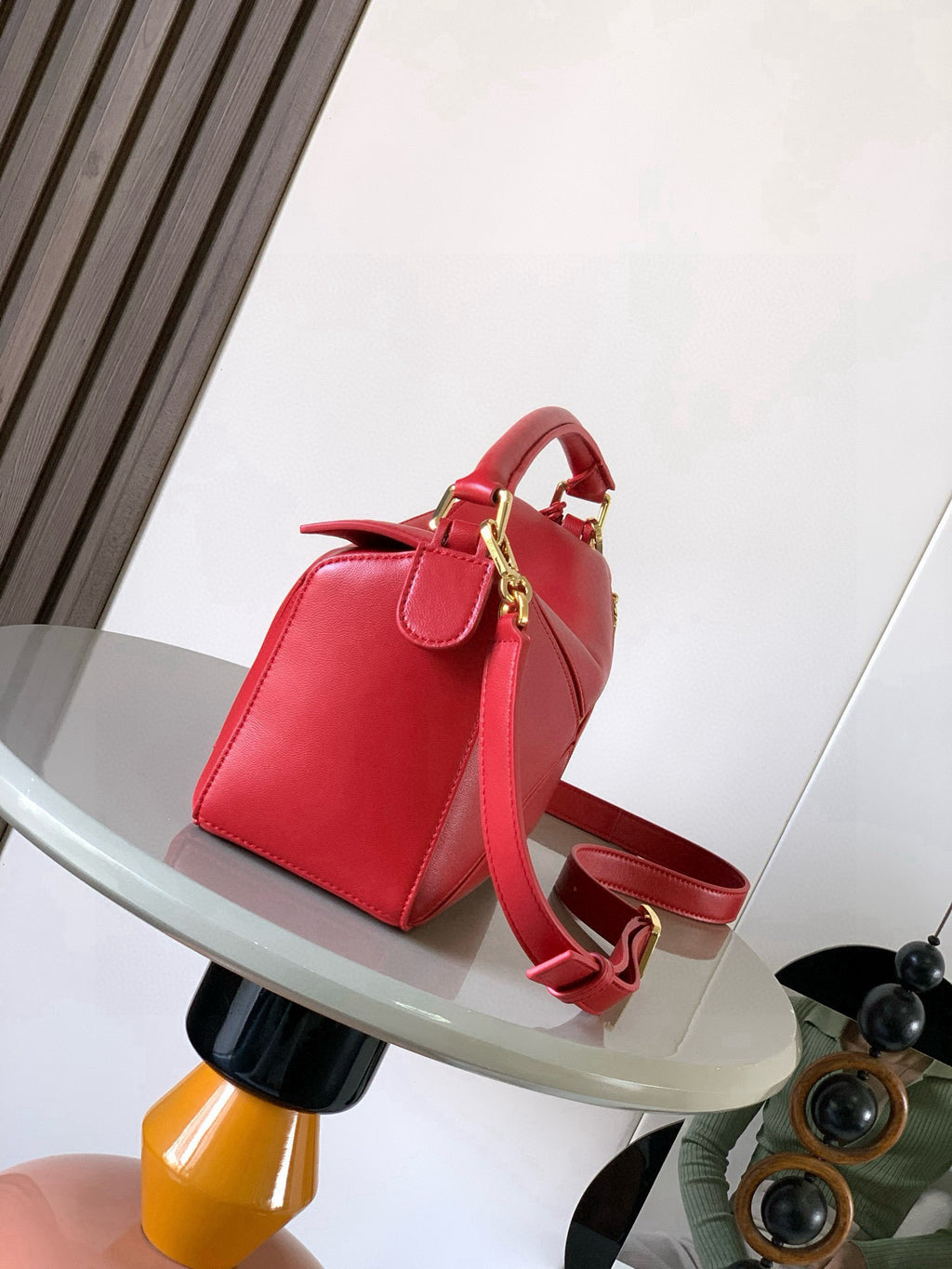 Loewe red leather mini bag with detachable shoulder strap and gold clasp
