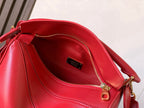 Loewe red leather bag interior view with zip opening and inner slip pocket