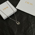 Silver-tone Dior necklace with D charm pendant on link chain
