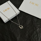 Silver-tone Dior necklace with D charm pendant on link chain