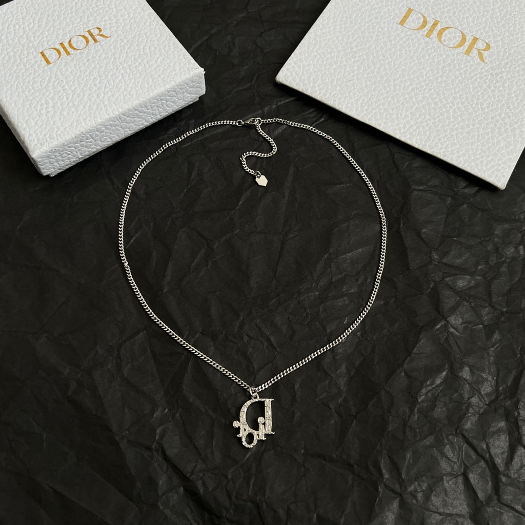 Silver-tone Dior necklace with D charm pendant and small pavé accents