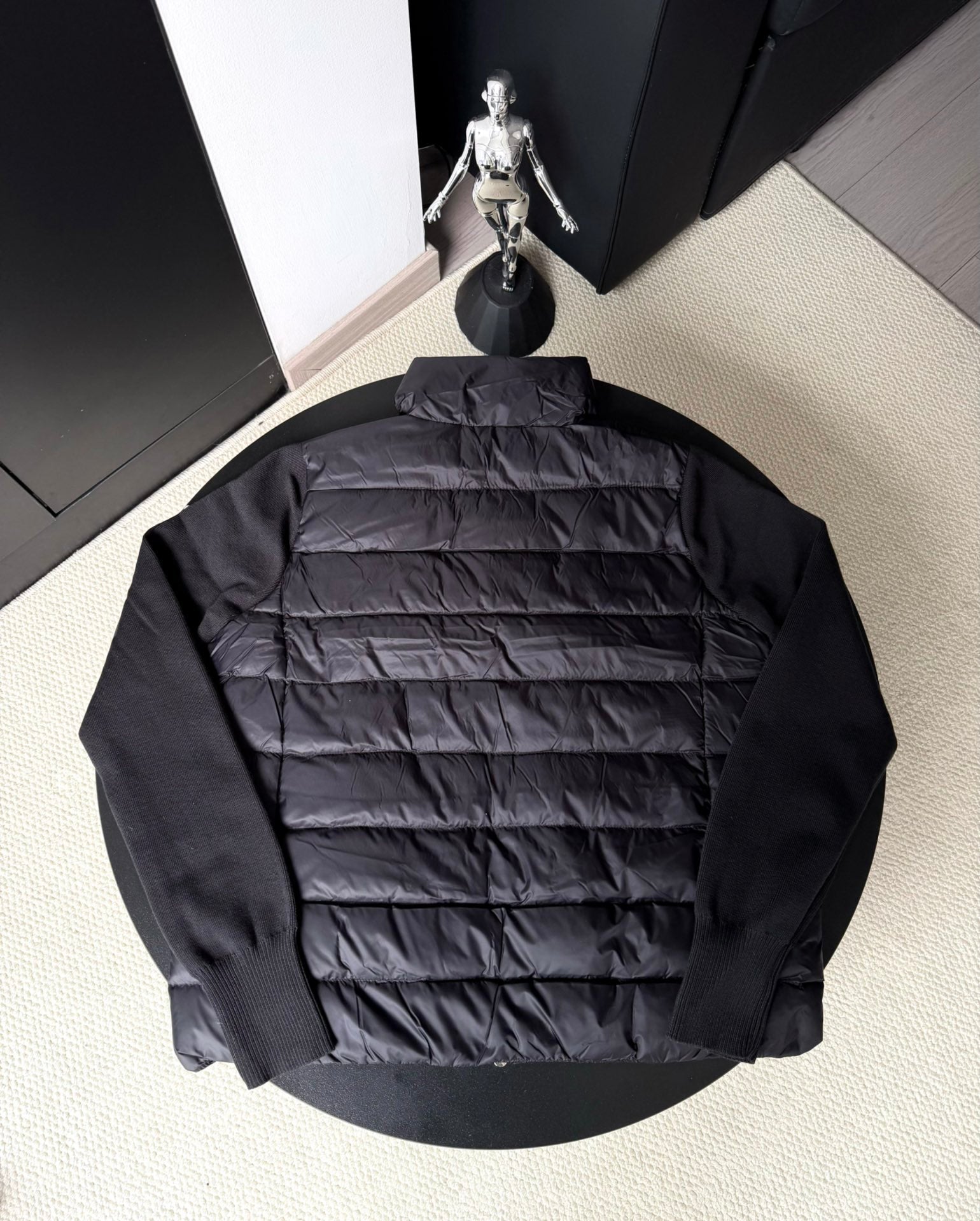 Long puffer jacket with quilted stripes and full back zipper, dark tone