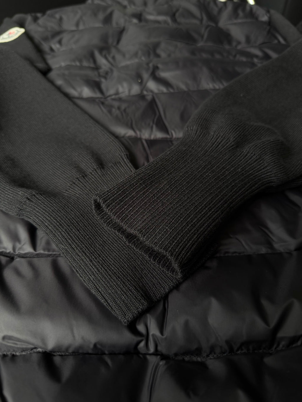Ribbed knit sleeve cuff on puffer jacket
