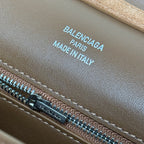 Balenciaga suede bag with printed logo label and zipper pull, brown