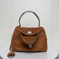 Balenciaga suede top-handle bag with front flap and metal lock clasp, tan brown