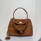 Balenciaga suede top-handle bag with front flap and metal lock clasp, tan brown