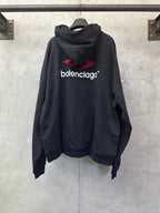 Black Balenciaga logo hoodie, back view with red emblem and cowl hood