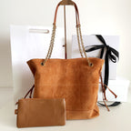 YSL suede tote bag with chain handles and tan leather side accents, with pouch