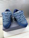 Blue unisex Dior sneakers, quilted logo pattern with lace-up strap