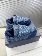 Blue unisex Dior sneakers, top view with quilted logo fabric and laces