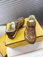Brown lace-up low-top sneakers with cream lining and Fendi Roma label on tongue