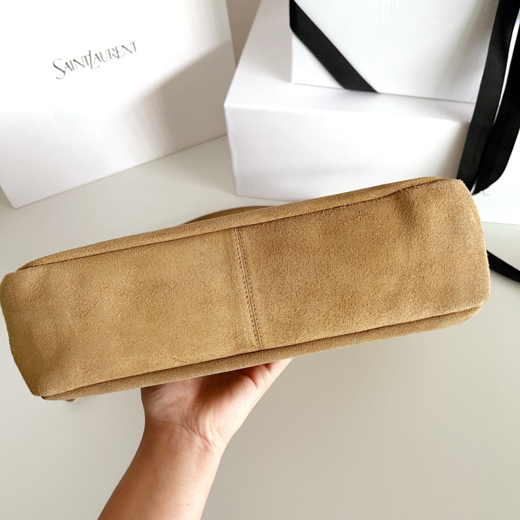 Tan suede tote bag, side view, with structured top and stitched trim