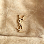 YSL logo hardware on tan suede tote bag front panel